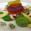 Raw Vegan Sunflower Veggie Burger on Spinach and Lettuce Bun